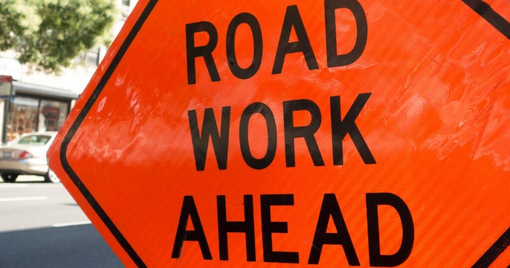 road work sign to prevent work zone crash